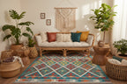 Colorful geometric patterned rug on a plain background