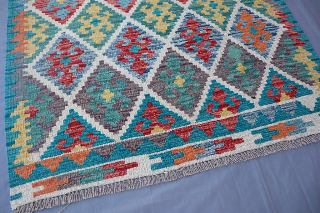 Handmade Afghan Kilim Rug – 128x183 cm | Turquoise & Multicolor Tribal Wool Carpet