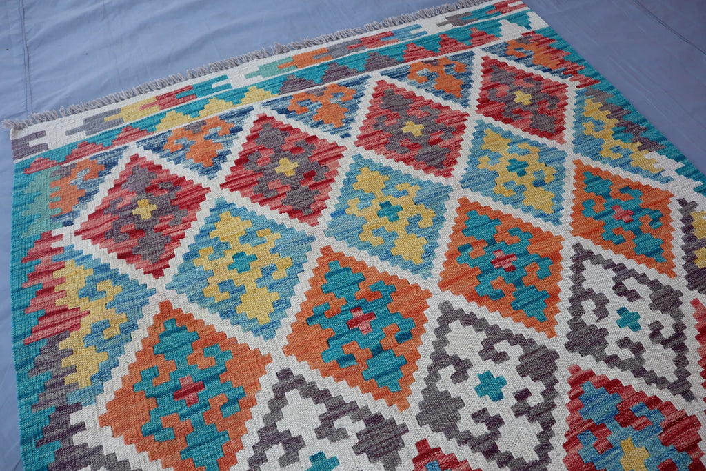 Handmade Afghan Kilim Rug – 128x183 cm | Turquoise & Multicolor Tribal Wool Carpet