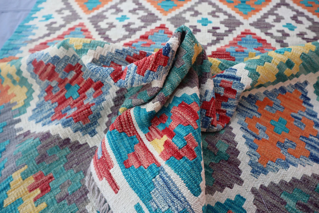 Handmade Afghan Kilim Rug – 128x183 cm | Turquoise & Multicolor Tribal Wool Carpet