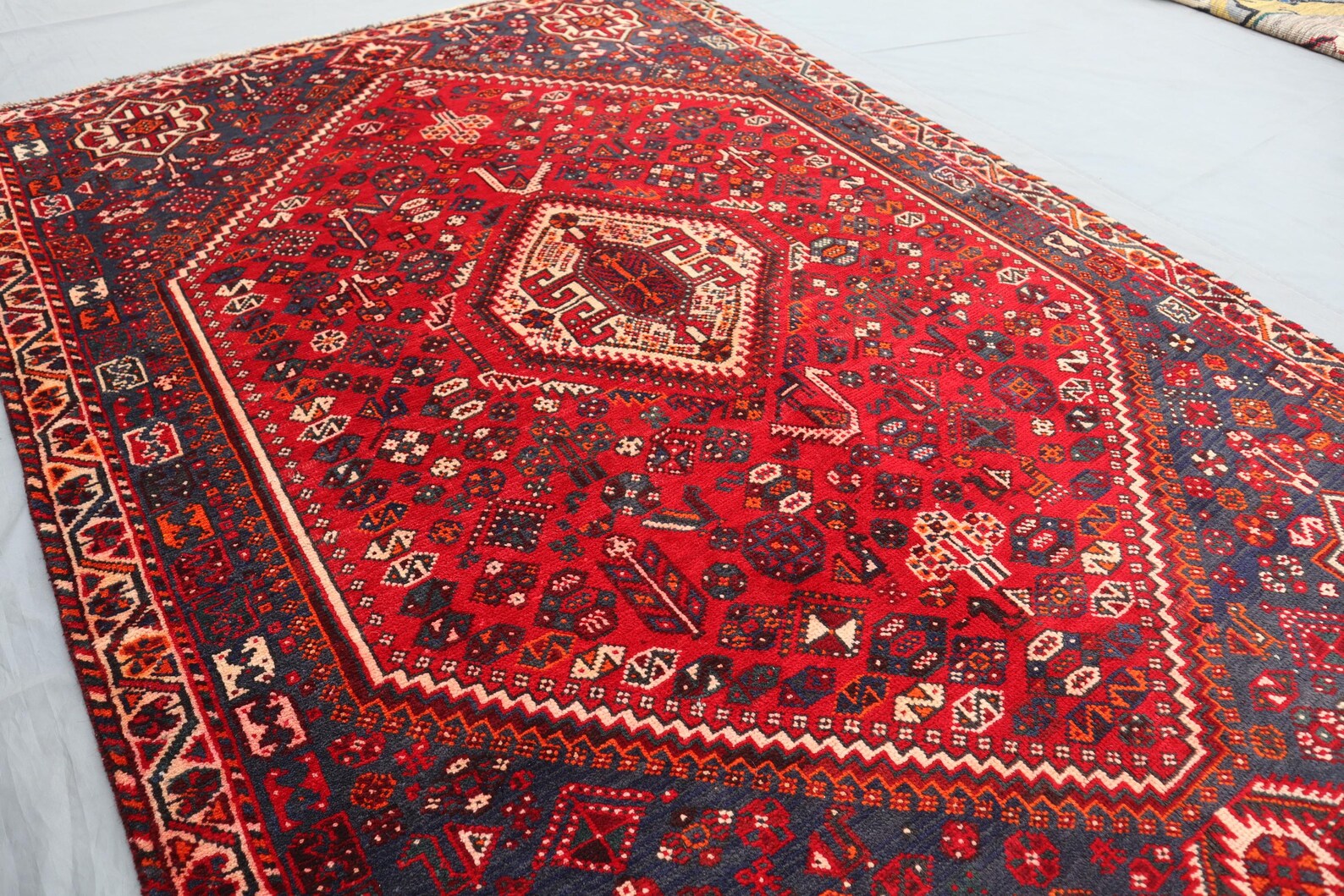 Handmade Afghan Wool Rug – 5x7ft Carpet | Vintage Tribal Red and Navy Caucasian Geometric by Nomad Weaves