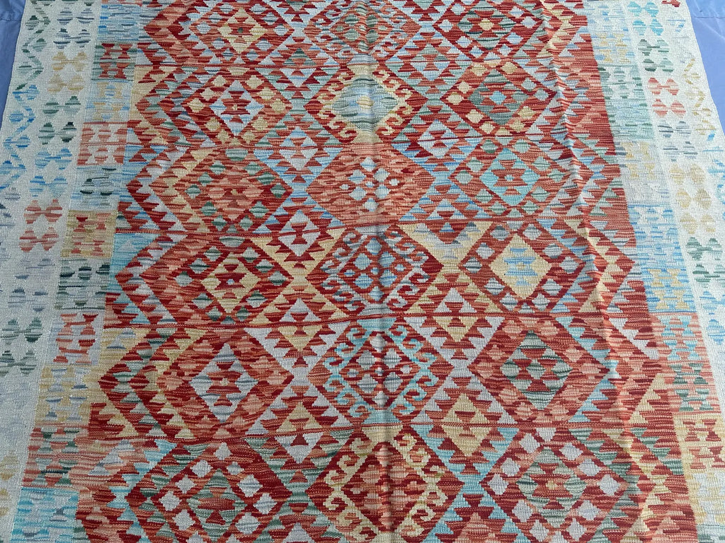 Handmade Afghan Kilim Rug – 210x305 cm | Terracotta & Sky Blue Wool Carpet with Ivory Border
