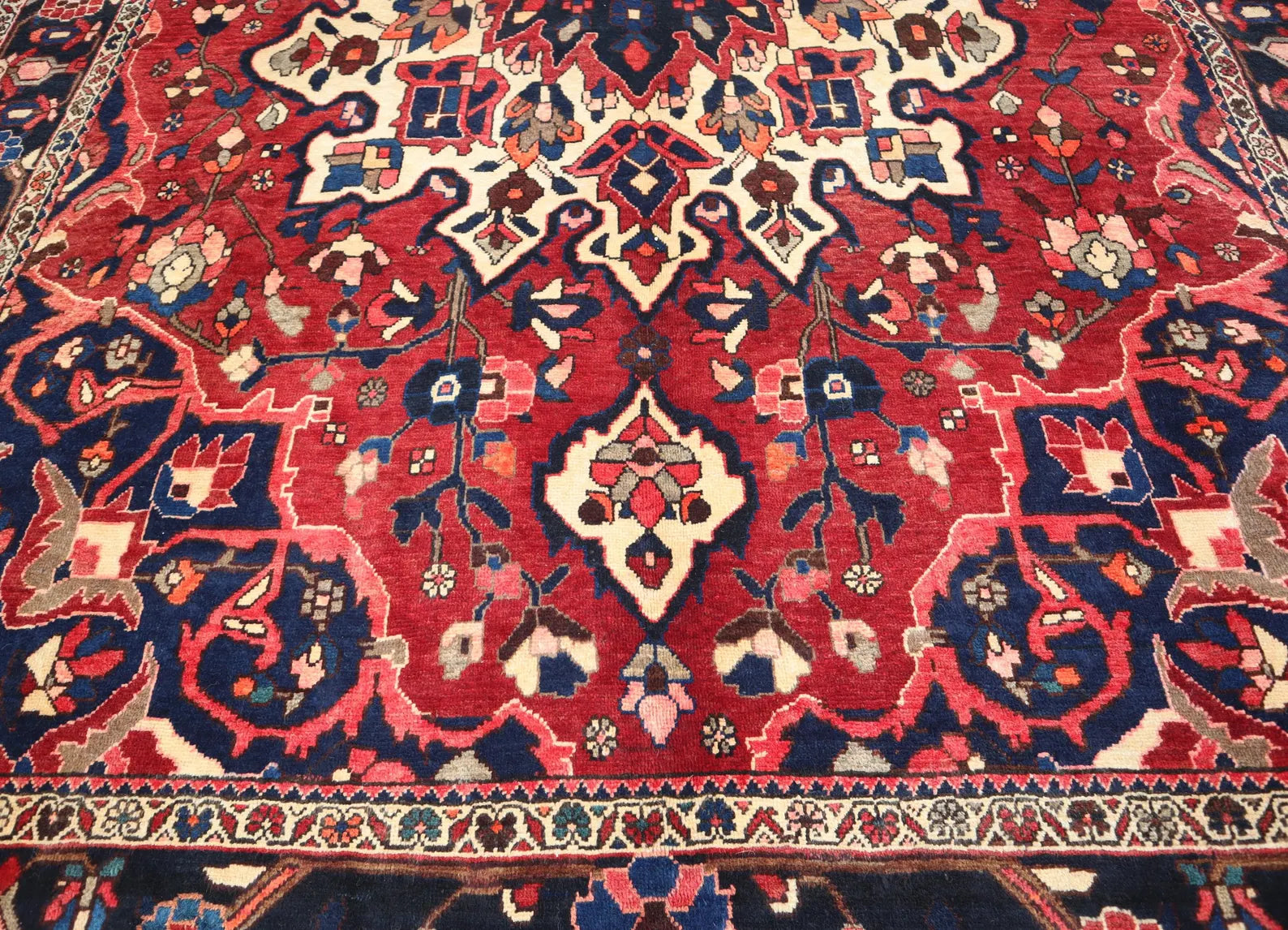 Persian Heriz Rug – 6.10 × 10.2 ft | Hand-Knotted Wool Carpet | Red & Navy Medallion Design
