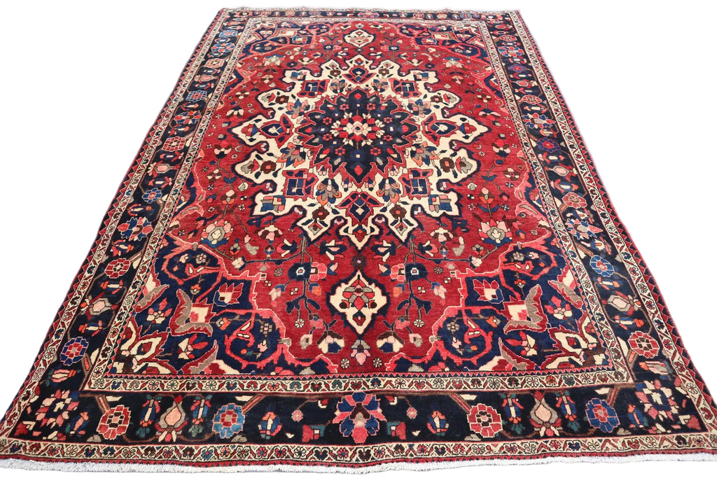 Persian Heriz Rug – 6.10 × 10.2 ft | Hand-Knotted Wool Carpet | Red & Navy Medallion Design
