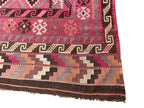 Decorative border detail of a vintage Afghan Kilim featuring nomadic tribal symbolism
