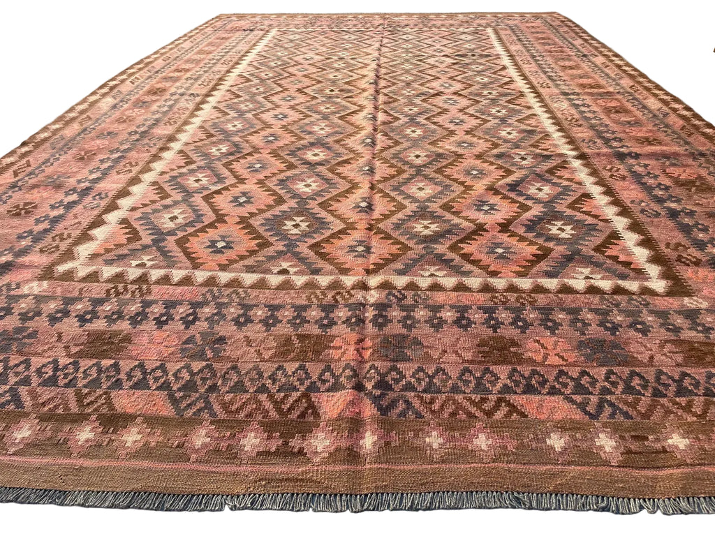 Large Afghan Kilim rug measuring 251 x 378 cm, featuring dusty rose, muted terracotta, brown and charcoal geometric diamond patterns with traditional tribal borders.