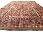 Large Afghan Kilim rug measuring 251 x 378 cm, featuring dusty rose, muted terracotta, brown and charcoal geometric diamond patterns with traditional tribal borders.