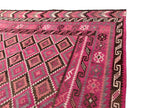 Traditional Afghan wool Kilim rug showcasing intricate craftsmanship and artisan weaving techniques
