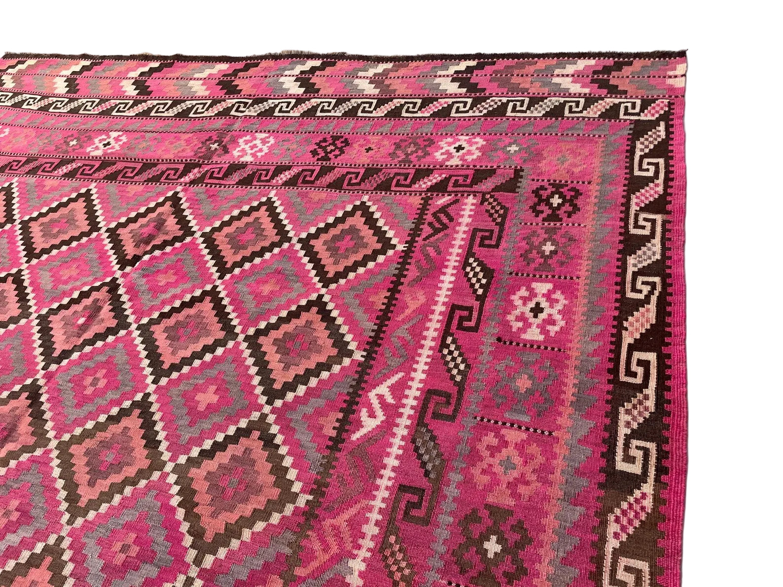 Traditional Afghan wool Kilim rug showcasing intricate craftsmanship and artisan weaving techniques